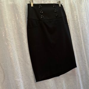 Slightly above the knee black skirt